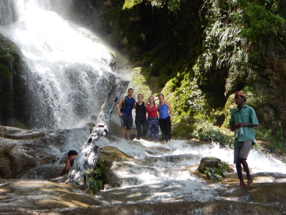 Students exploring the Saut D'Eau waterfall, near Saut D'eau, Haiti